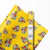 Roll of glossy Pokemon wrapping paper featuring Pikachu and Ash.