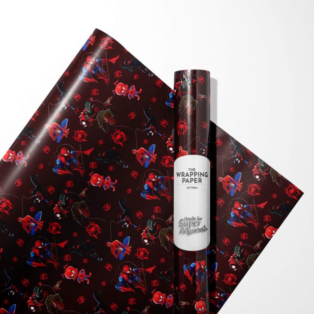 A shot of the Spiderman wrapping paper being unrolled, showing the smooth, crease-free surface.