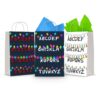 Three printable Stranger Things gift bag fronts on paper party bags — the alphabet wall with A to Z under strings of coloured Christmas lights, shown in dark-with-red, navy-with-white and white-with-black colourways.