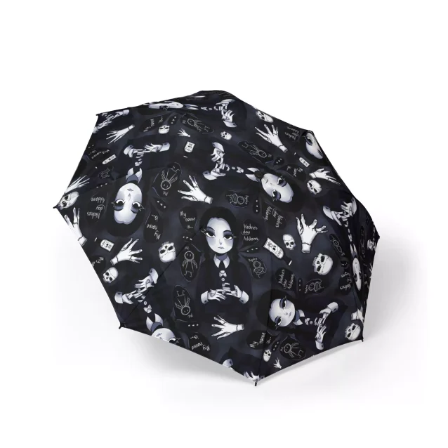 Wednesday Addams umbrella shown fitting into a backpack.