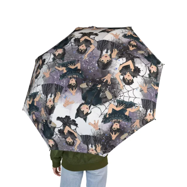 Opening the Wednesday Addams umbrella one-handed at the press of a button.
