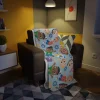 A blue Cocomelon plush blanket featuring all the characters, perfect for snuggles and bedtime stories.