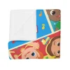 Child happily washing the Cocomelon fleece blanket in a washing machine