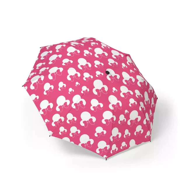 The Minnie Mouse umbrella shown from the side, highlighting its 37-inch coverage diameter.