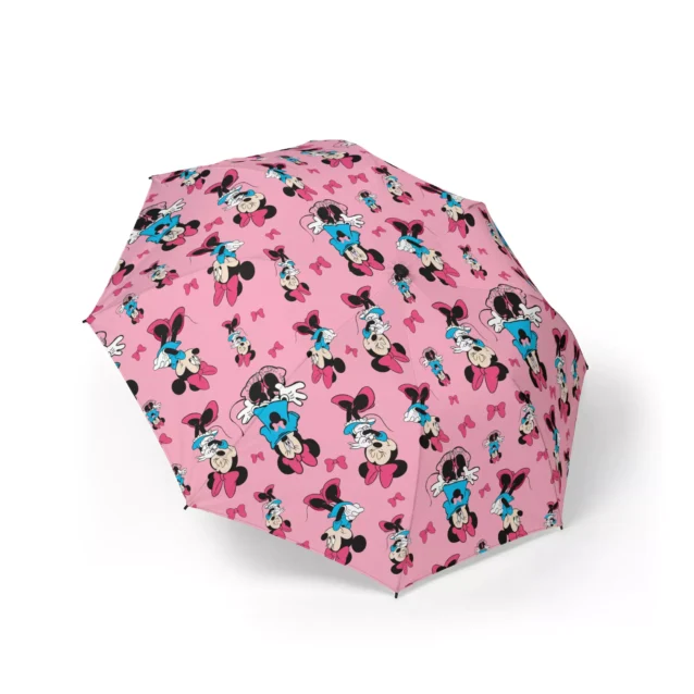 Minnie Mouse Minnie Cartoon Poses (Pink) umbrella held open in the rain.