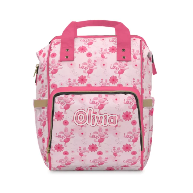 Pink Piglet diaper bag backpack with daisies and "Love" lettering, the baby's name printed on the pocket.