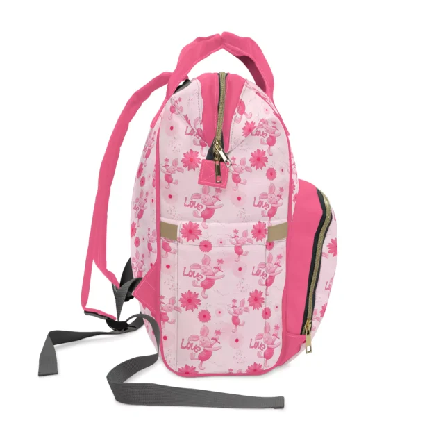 Pink Winnie the Pooh diaper bag: A spoonful of sweetness for every diaper change.