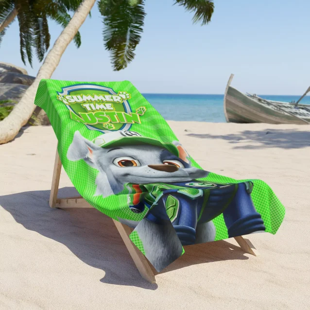 Green Paw Patrol beach towel featuring Rocky, the recycling pup, perfect for personalized fun at the beach.