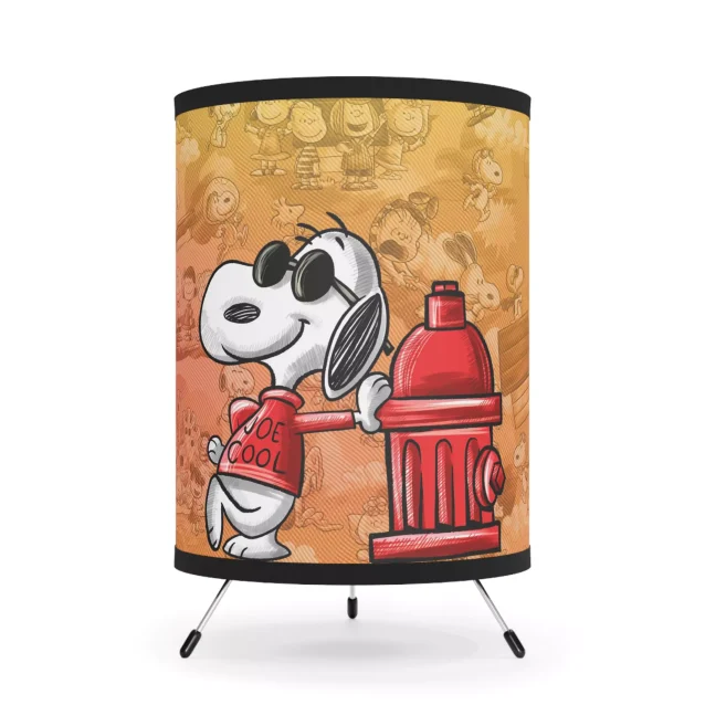 Orange Snoopy Tripod Night Light: A bright orange night light featuring Snoopy, the Peanuts beagle, on a sturdy tripod base.