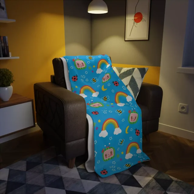 Snuggle up with your favorite Cocomelon friends on this plush blue fleece throw blanket. Perfect for naptime or movie nights!