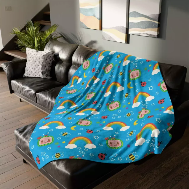 Make bedtime a breeze with this cuddly Cocomelon fleece throw. It's super soft and features all your child's favorite characters.