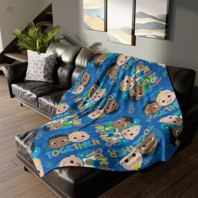 Bring the fun of Cocomelon home! This cuddly dark blue fleece throw blanket is adorned with all your child's favorite characters.