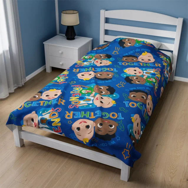 Snuggle up for story time or movie nights with this super soft, dark blue Cocomelon fleece throw blanket.