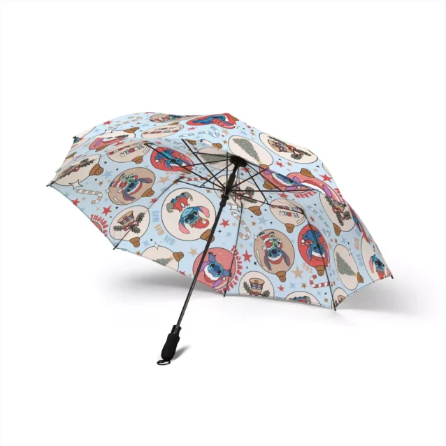 The soft foam handle of the Lilo & Stitch Christmas umbrella, held in one hand.