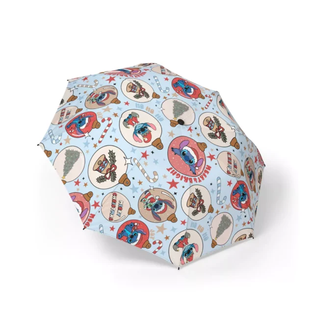 Lilo & Stitch Christmas Stitch Christmas Baubles (White) umbrella held open in the rain.