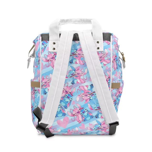 Fun and functional Lilo & Stitch diaper bag in white, pink, and blue. Makes diaper changes fun!