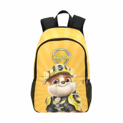 Child wearing a bright yellow Paw Patrol backpack with their name and an image of Rubble the bulldozer pup. The backpack has padded shoulder straps and side mesh pockets for a water bottle.