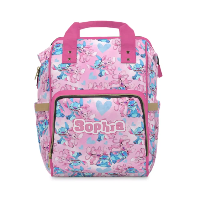 Pink Angel and Stitch diaper bag backpack with blue hearts and pink handles.