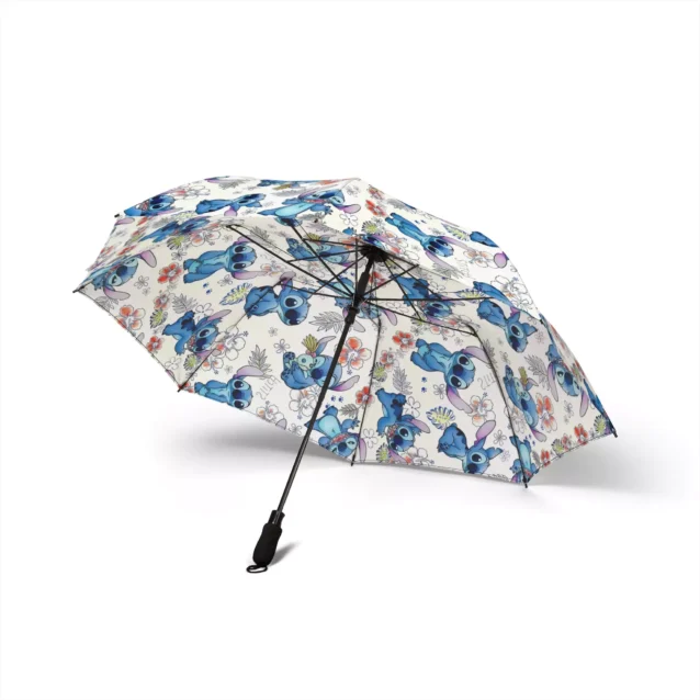 Rain beading on the waterproof canopy of the Stitch umbrella.