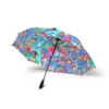 The Stitch umbrella tucked under an arm, folded away.