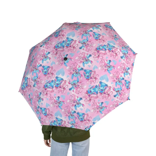 The Stitch umbrella drying open on a kitchen floor after the school run.