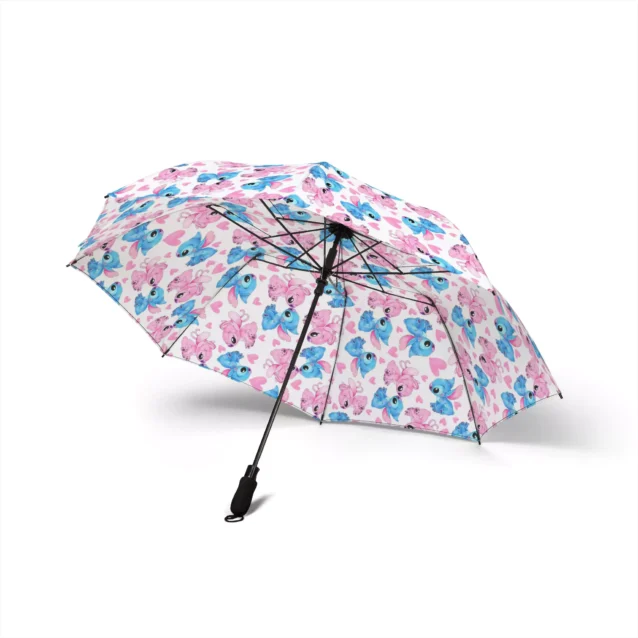 The canopy of the Stitch umbrella catching the light after rain.