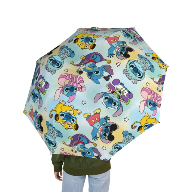A child carrying the Stitch umbrella on the way to school.