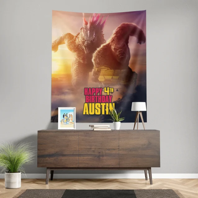 Monster bash: Throw an epic birthday with a Kong X Godzilla banner.