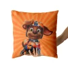 Zuma from Paw Patrol on a vibrant orange pillow cover.