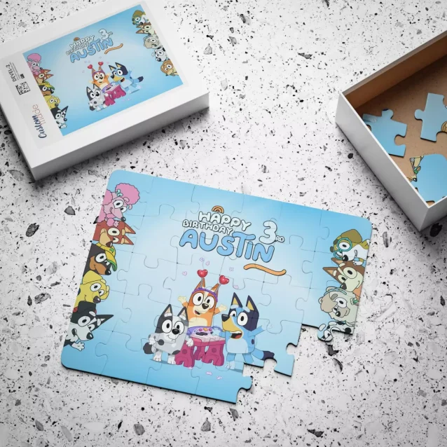 The complete Bluey Heeler Family Fun Puzzle Pack with two puzzles and four character figures.