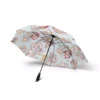 The soft foam handle of the Bluey Christmas umbrella, held in one hand.