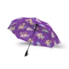Rain beading on the waterproof canopy of the Bluey Halloween umbrella.