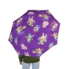 The Bluey Halloween umbrella standing open to dry after a downpour.