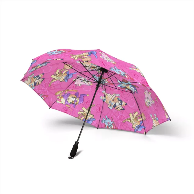 The soft foam handle of the Bluey Halloween umbrella, held in one hand.