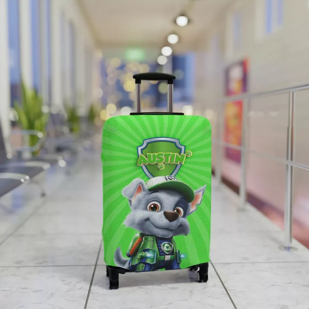 Adventure awaits! Green Paw Patrol Rocky luggage cover, featuring your child's name for easy identification and pup-tastic travels.