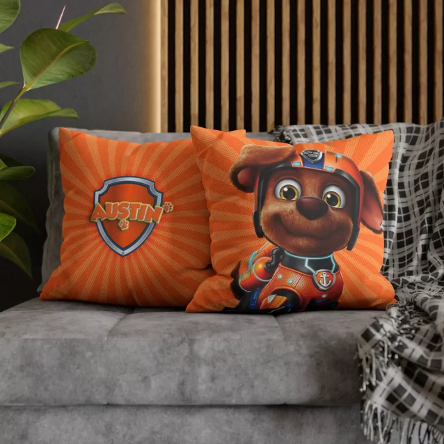 Bright orange Paw Patrol pillowcase with Zuma in action.