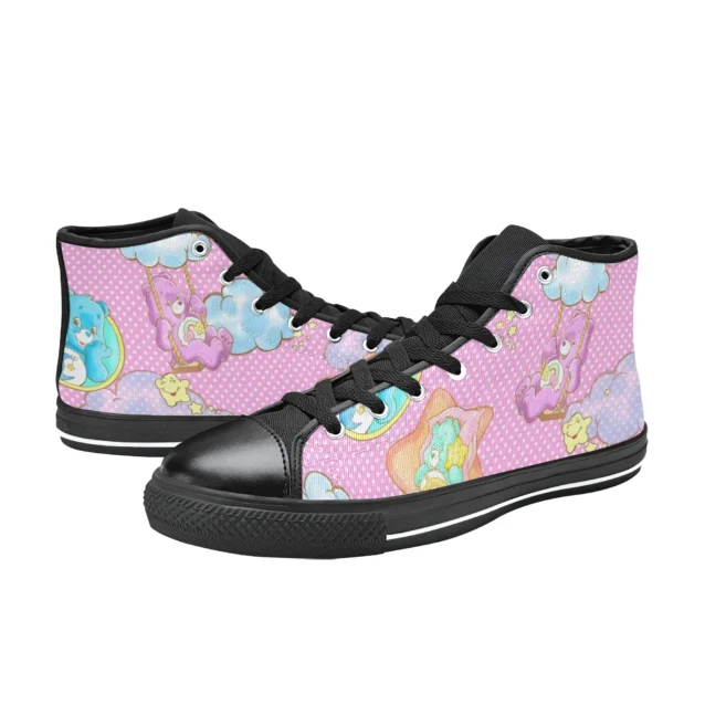 Close-up of the rainbow belly badge graphic on the pink toddler sneakers.