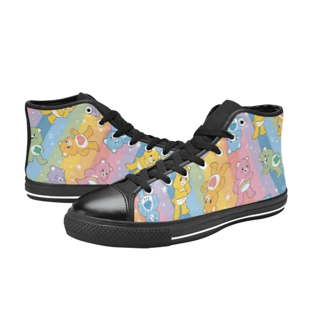 Close-up of the smiling sun belly badge on the yellow toddler sneakers.