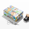 A birthday gift wrapped in colorful Garfield Wrapping Paper with a bow.