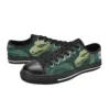 Side profile of green canvas sneakers showcasing the Slytherin snake house crest.