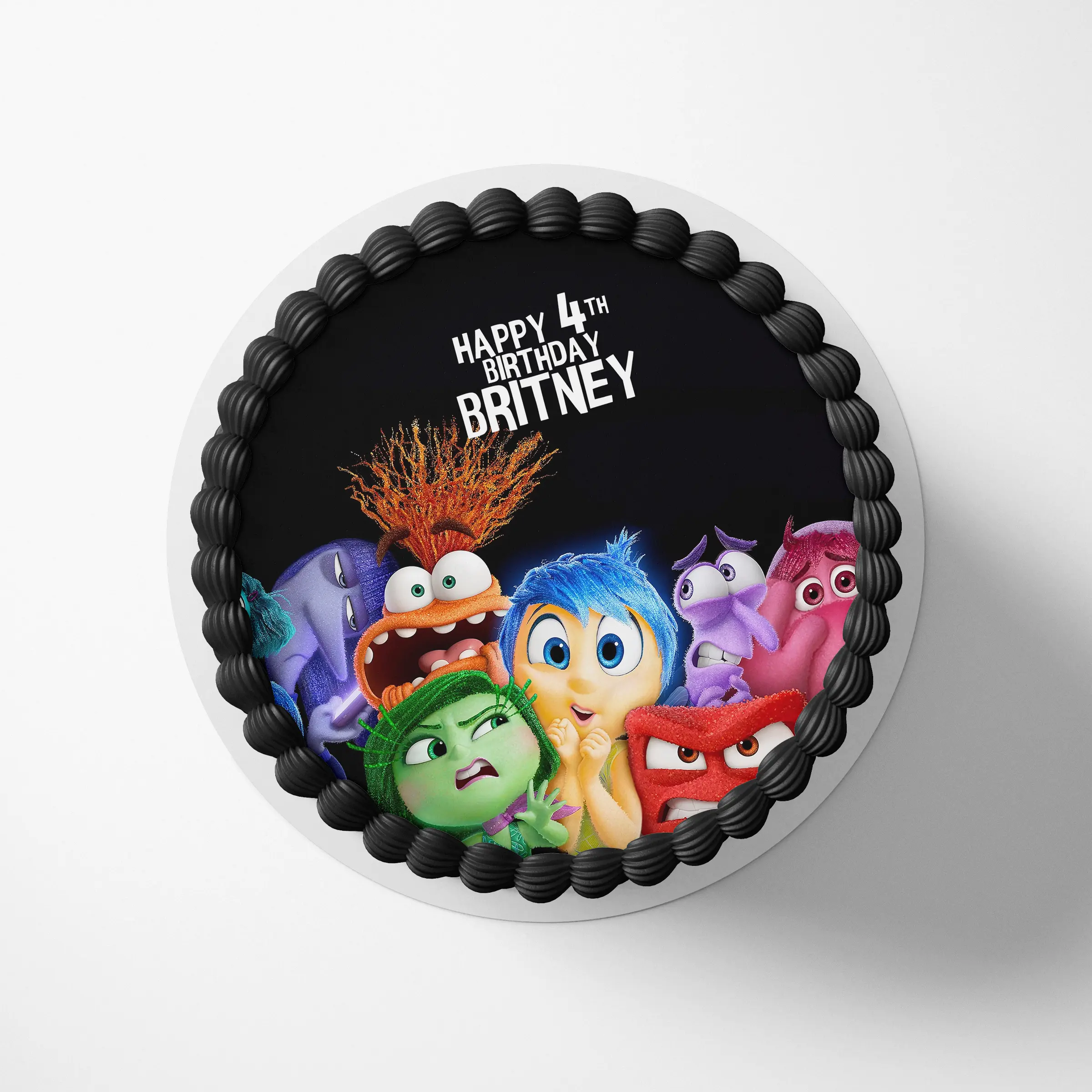 Personalized Inside Out 2 full cast cake topper on a round birthday cake