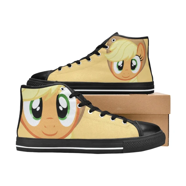 Close-up of the pink butterfly cutie mark on the yellow toddler shoes.