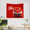 A birthday decoration featuring a grumpy red character, Anger, from the movie "Inside Out". The banner is red and decorated with flames.
