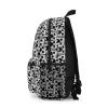 Detailed shot of the customizable patch on the front of the explosive-themed backpack, ready for a custom name.