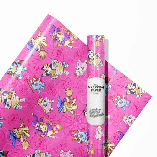 A haunted house with Bluey and her family on Halloween wrapping paper.