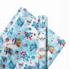 Festive wrapping paper featuring Stitch, the iconic Disney character, enjoying the Christmas season.