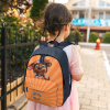 A personalized Paw Patrol Zuma backpack with a spacious main compartment and side pockets.