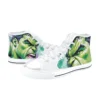 Close-up of the vibrant purple laces and green canvas on the superhero skater sneakers.