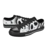 Close-up of the bat bowtie and skull graphics on the Jack Skellington low top sneakers.