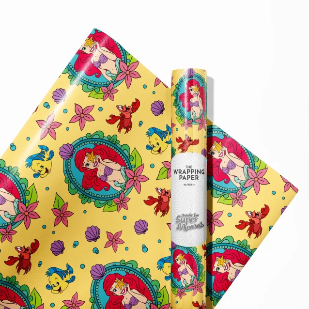 A roll of glossy gift wrapping paper with a repeating pattern of Princess Ariel, colorful fish, and seashells from The Little Mermaid.
